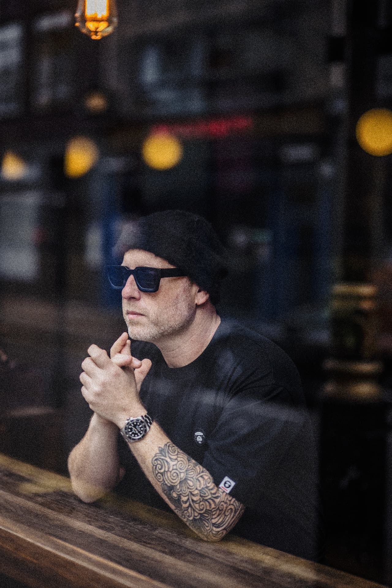 Biblical Beats seen through a café window